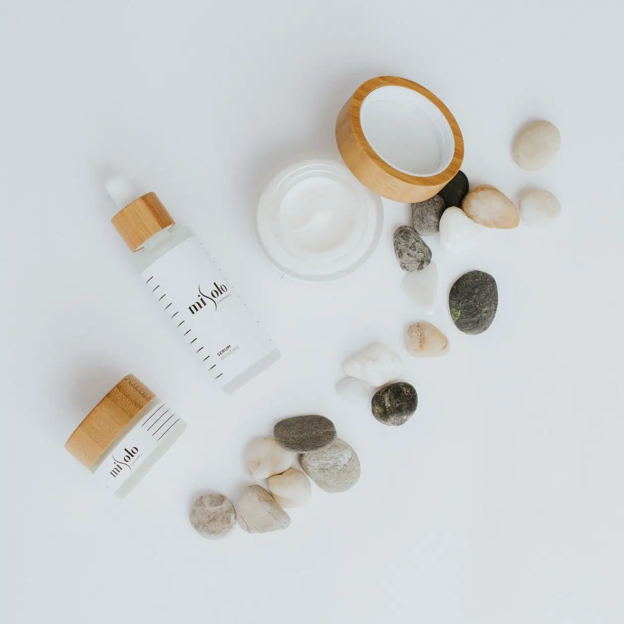 Flat lay of skincare and beauty products with soft natural styling, hybrid product photography approach