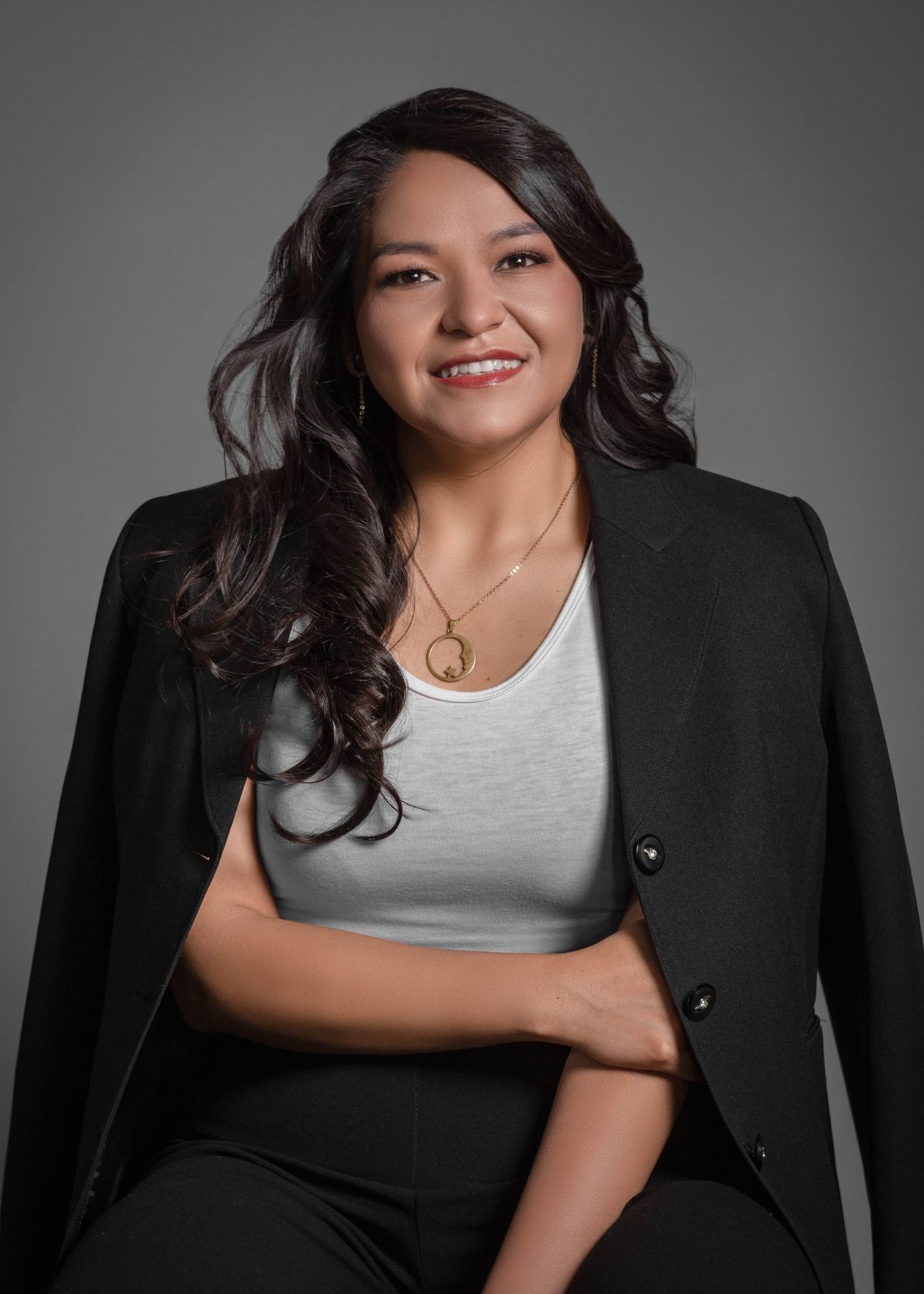 Professional portrait of a smiling businesswoman in a studio, corporate headshot photography