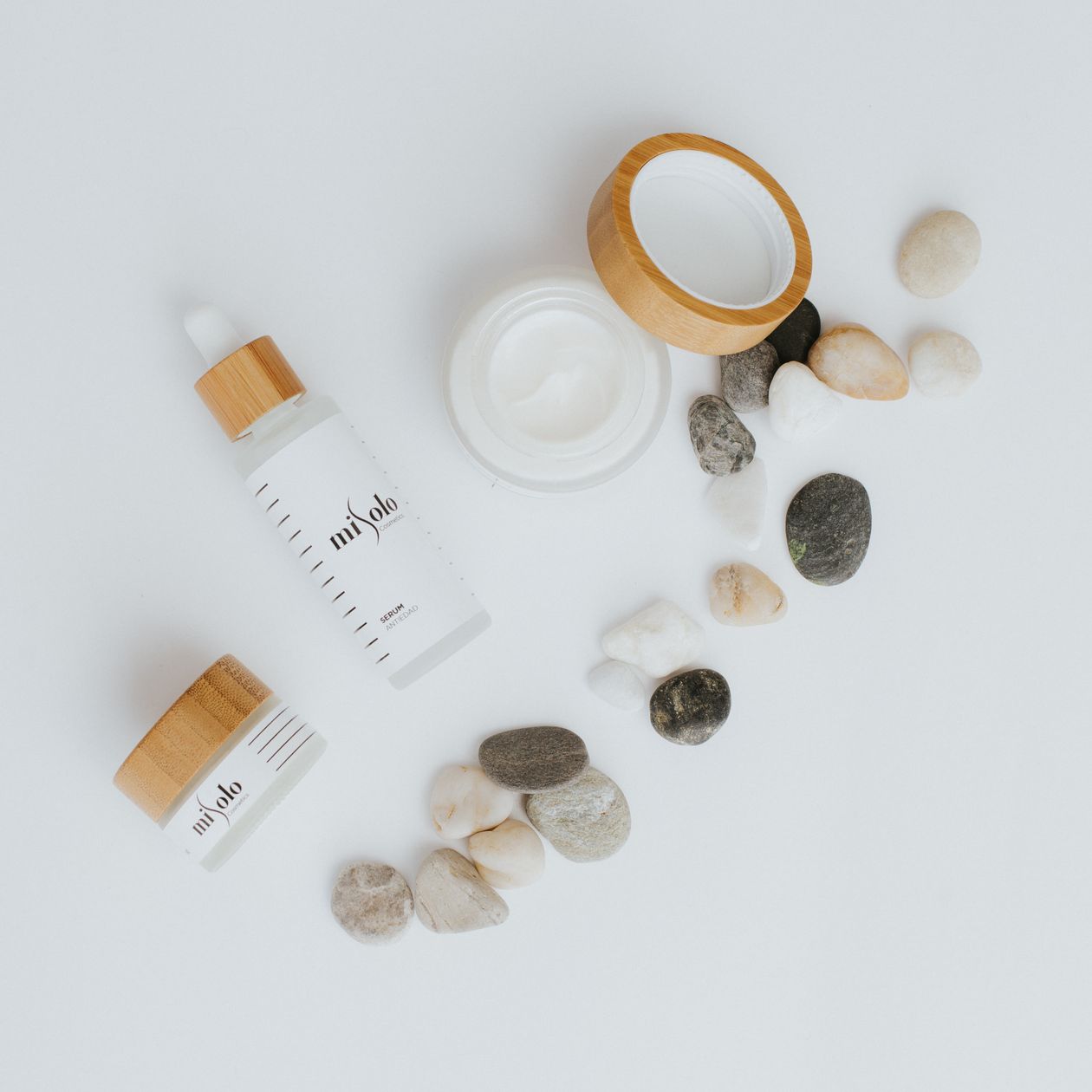 Flat lay of skincare and beauty products with soft natural styling, hybrid product photography approach