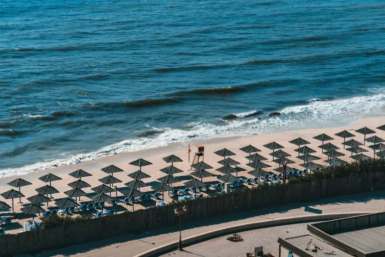 People on Ajman Corniche beach during the day